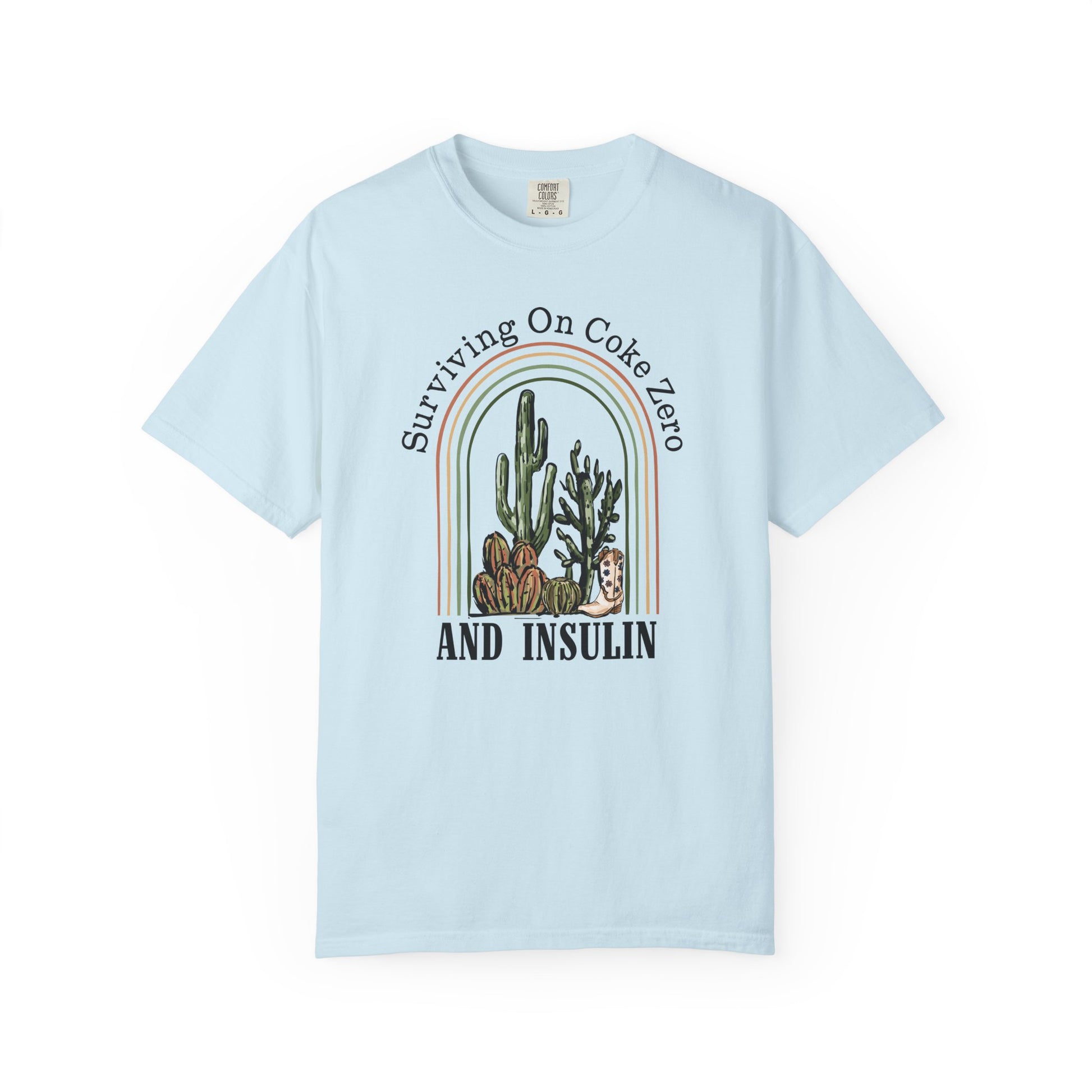 Surviving on Coke Zero Diabetes TShirt featuring cacti design on a light blue unisex shirt.