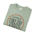 Surviving on Coke Zero Western Diabetes Tshirt displaying a curled rope design with bold text on a soft green fabric.