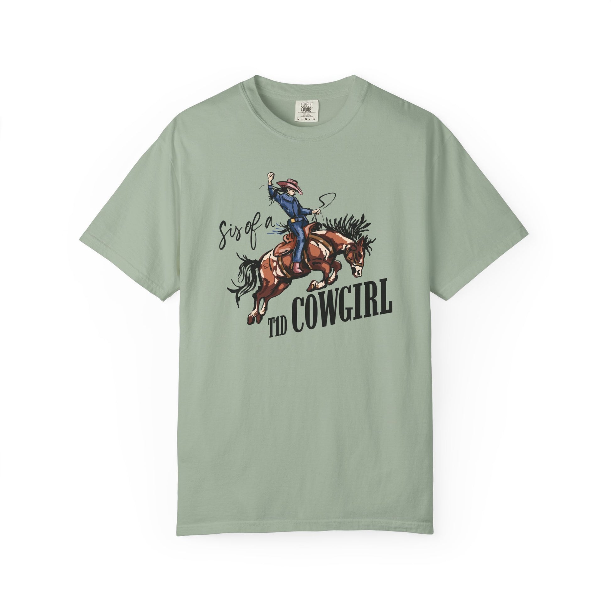 Sis of a T1D Cowgirl T-Shirt with a playful cowgirl and insulin pump design celebrating diabetes awareness.