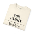 God, Family, & Insulin Diabetes T-Shirt folded on white background, promoting faith and diabetes awareness.